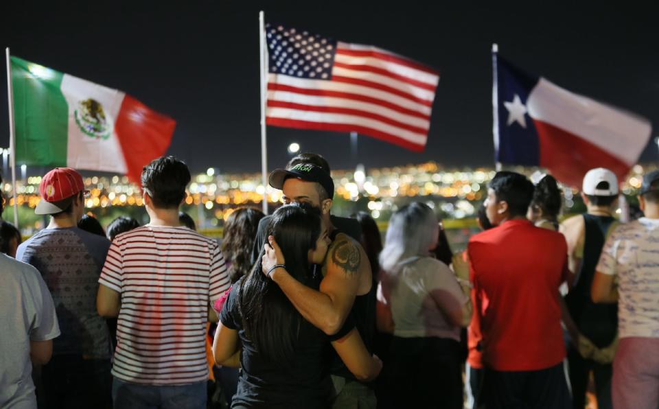 The memorial outside the Walmart in El Paso, Texas, continues to grow Monday, Aug. 5, 2019, as more El Pasoans arrive to leave flowers, pray and light a candle for the victims of the attack at Walmart on Saturday, Aug. 3, 2019, that claimed 22 lives and left 25 others injured.