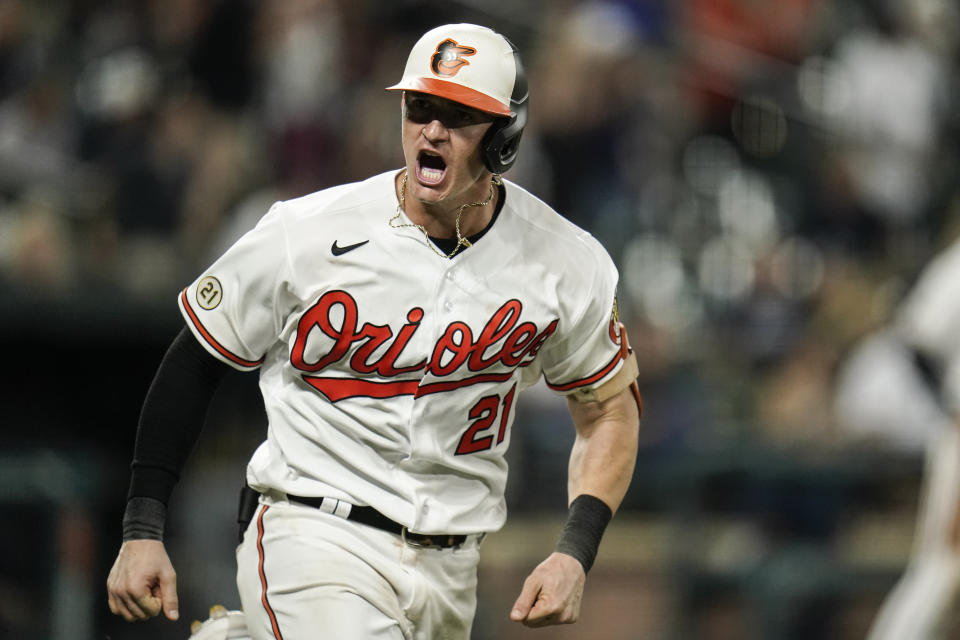 Baltimore Orioles' Austin Hays shouts toward his dugout as he runs after hitting a two-run home run off New York Yankees relief pitcher Chad Green during the eighth inning of a baseball game, Wednesday, Sept. 15, 2021, in Baltimore. (AP Photo/Julio Cortez)