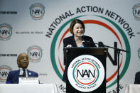 Democratic presidential candidate Sen. Amy Klobuchar, D-Minn speaks at the National Action Network South Carolina Ministers' Breakfast, Wednesday, Feb. 26, 2020, in North Charleston, S.C., as The Rev. Al Sharpton looks on. (AP Photo/Matt Rourke)