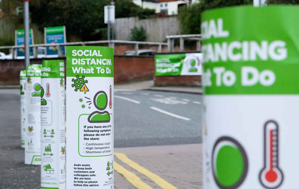 SHEFFIELD, UNITED KINGDOM - APRIL 18, 2020 - Coronavirus: social distancing signs outside an Asda store- PHOTOGRAPH BY Matthew Chattle / Barcroft Studios / Future Publishing (Photo credit should read Matthew Chattle/Barcroft Media via Getty Images)