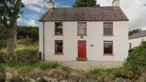 <p>Sitting on the coast of Antrim Coast & Glens Area of Outstanding Natural Beauty, this Christmas cottage comes with dramatic views. Step inside the festive red front door and you'll discover a quirky layout downstairs, which includes a spacious living room with woodburner, separate dining room and modern kitchen – everything you need for a social family Christmas.</p><p><strong>Be sure to... </strong>Take a relaxing stroll on the sandy beach that curves right past the Christmas cottage. With its secluded setting just north of the village of Cushendun, it's ideal for a Christmas coastal escape with sea views from your bedroom. </p><p><strong>Sleeps:</strong> 5</p><p><strong>Pets:</strong> No</p><p><strong>Price: </strong>£849 for 7 nights over Christmas and New Year (short breaks can be booked one month before for peak periods)</p><p><a class="link " href="https://go.redirectingat.com?id=127X1599956&url=https%3A%2F%2Fwww.nationaltrust.org.uk%2Fholidays%2Fstrand-house-northern-ireland&sref=https%3A%2F%2Fwww.redonline.co.uk%2Ftravel%2Finspiration%2Fg33891719%2Fchristmas-cottage%2F" rel="nofollow noopener" target="_blank" data-ylk="slk:FIND OUT MORE;elm:context_link;itc:0;sec:content-canvas">FIND OUT MORE</a></p>