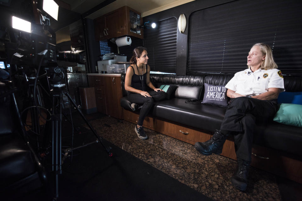 Fire Chief Jan Rader is interviewed by Sarah Grossman on the HuffPost bus.