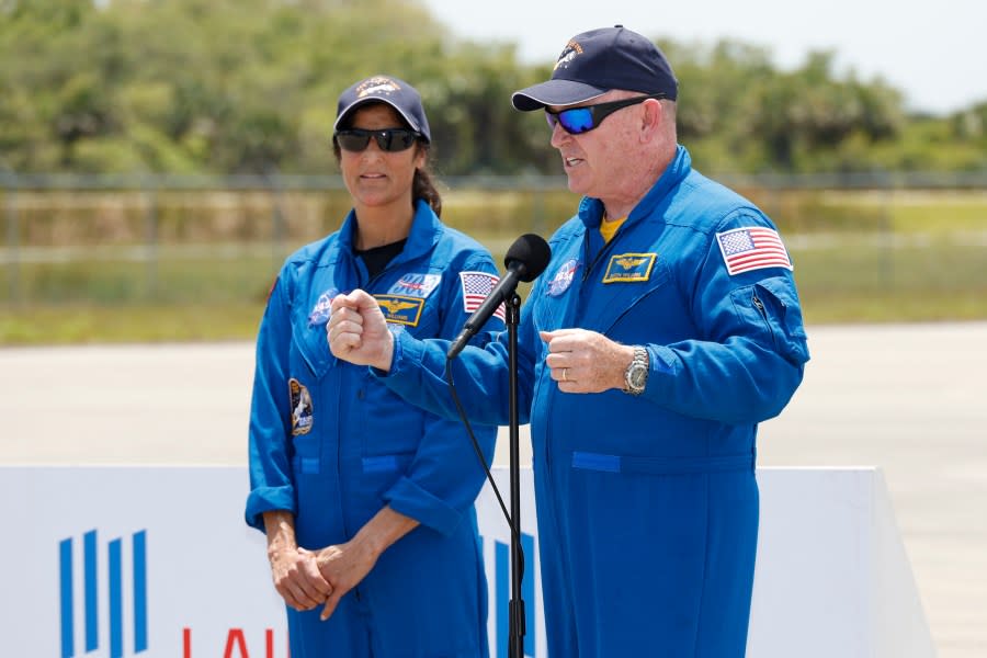 NASA astronauts Butch Wilmore, right, and Suni Williams speak to the media after they arrived at the Kennedy Space Center, Thursday, April 25, 2024, in Cape Canaveral, Fla. The two test pilots will launch aboard Boeing’s Starliner capsule atop an Atlas rocket to the International Space Station, scheduled for liftoff on May 6, 2024. (AP Photo/Terry Renna)