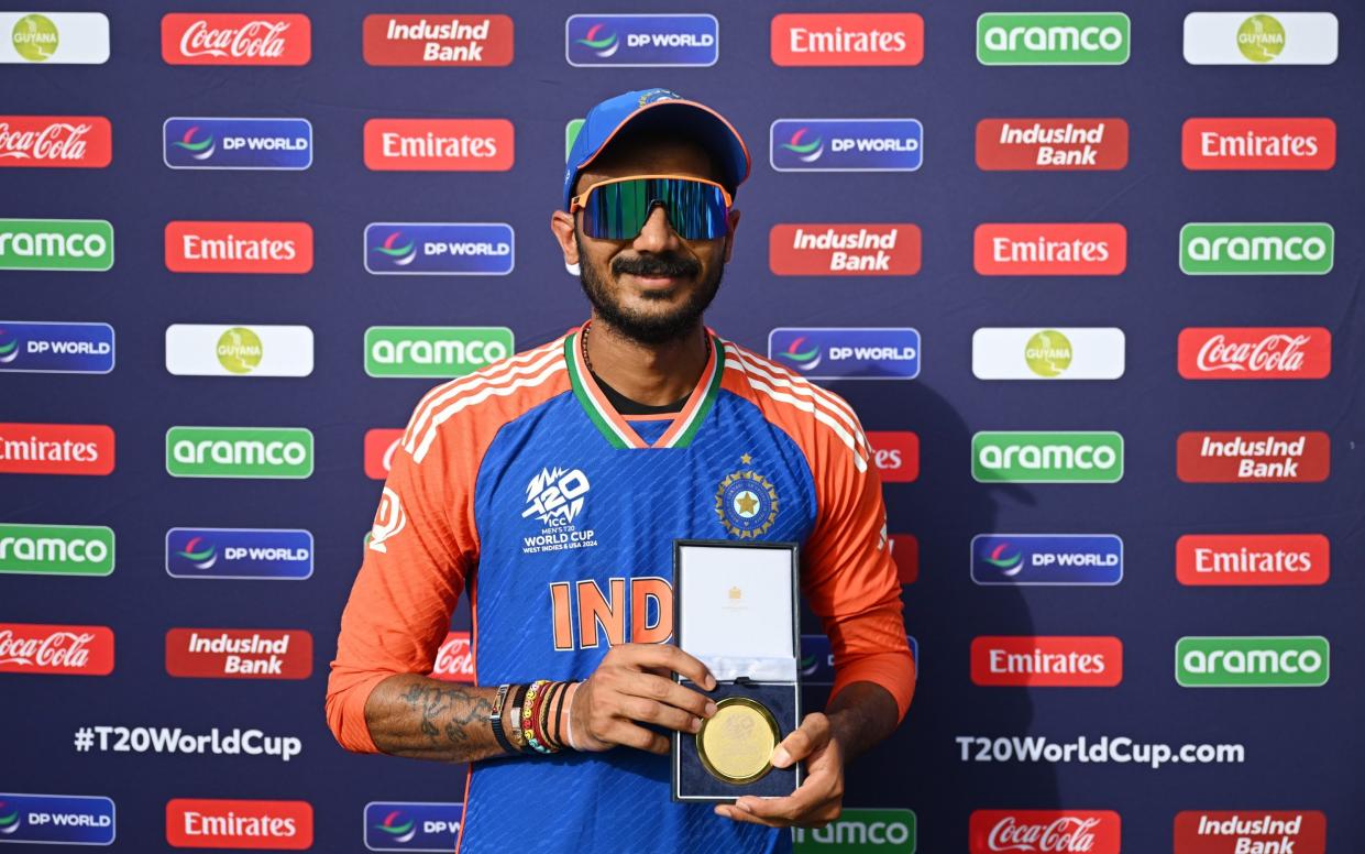 Axar Patel with the player of the match award