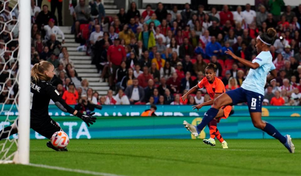 Nikita Parris, second right, scores England’s seventh goal (Martin Rickett/PA) (PA Wire)