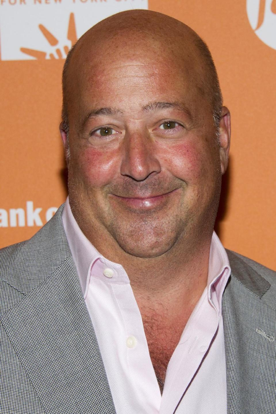 FILE - In this Oct. 11, 2012 file photo, Andrew Zimmern attends "On The Chopping Block: A Roast of Anthony Bourdain" in New York. The James Beard Foundation honored winners in media and publishing in New York on Friday, May 3, 2013, including Zimmern of Travel Channel's “Bizarre Foods America.” He was named outstanding host. (Photo by Charles Sykes/Invision/AP Images, File)