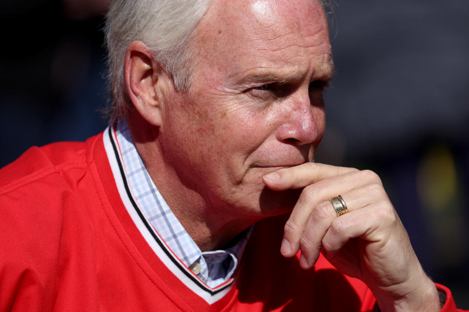 Senator Ron Johnson holds his hand up to his chin in thought.