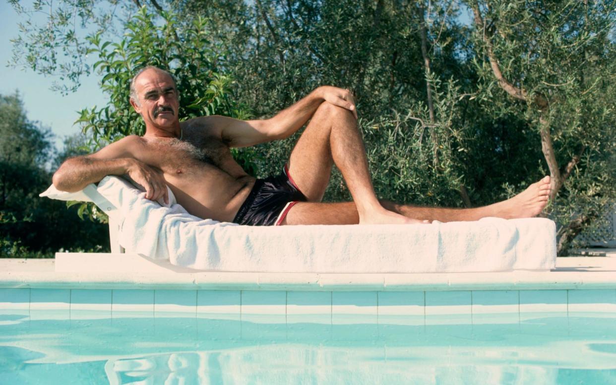 Sorry, men: you're not Sean Connery, by a poolside, in Marbella - Corbis