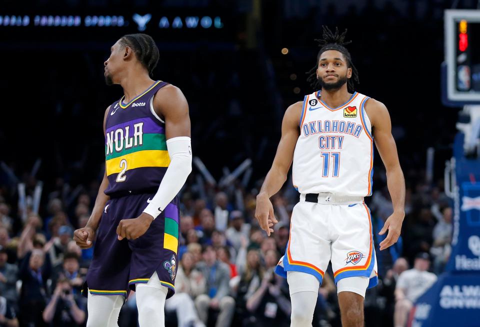 Oklahoma City's Isaiah Joe (11) reacts after a 3-point basket next to New Orleans' Josh Richardson (2) in the first half during the NBA basketball game between the Oklahoma City Thunder and the New Orleans Pelicans at the Paycom Center in Oklahoma City, Monday, Feb.13, 2023. 
