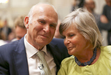 Vince Cable and his wife Rachel Smith attend the announcement of his confirmation as leader of Britain's Liberal Democrat Party in London, July 20, 2017. REUTERS/Neil Hall