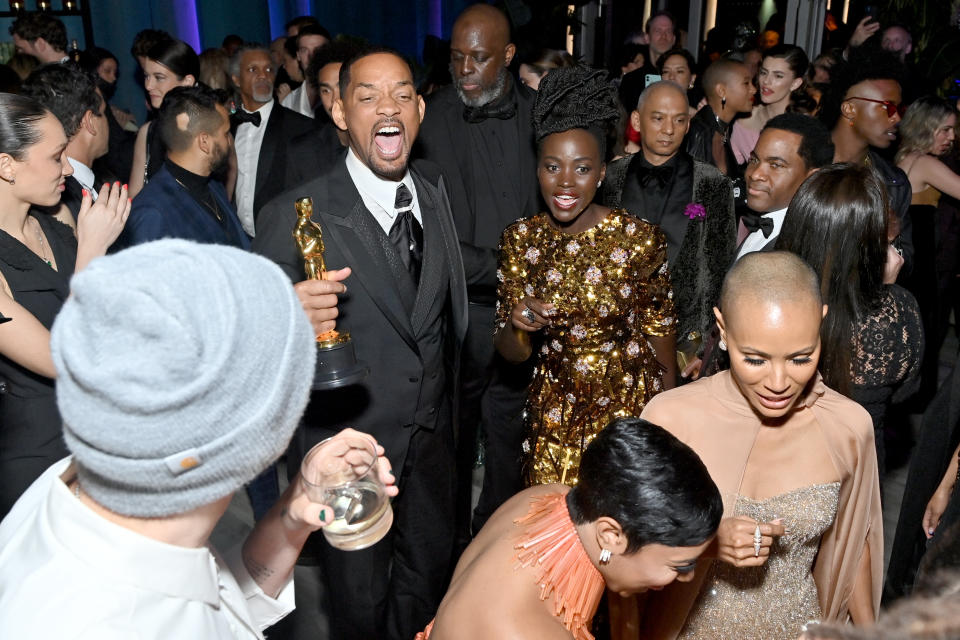 BEVERLY HILLS, CALIFORNIA - MARCH 27: Will Smith, Lupita Nyong&#39;o and Jada Pinkett Smith attend the 2022 Vanity Fair Oscar Party hosted by Radhika Jones at Wallis Annenberg Center for the Performing Arts on March 27, 2022 in Beverly Hills, California. (Photo by Stefanie Keenan/VF22/WireImage for Vanity Fair)