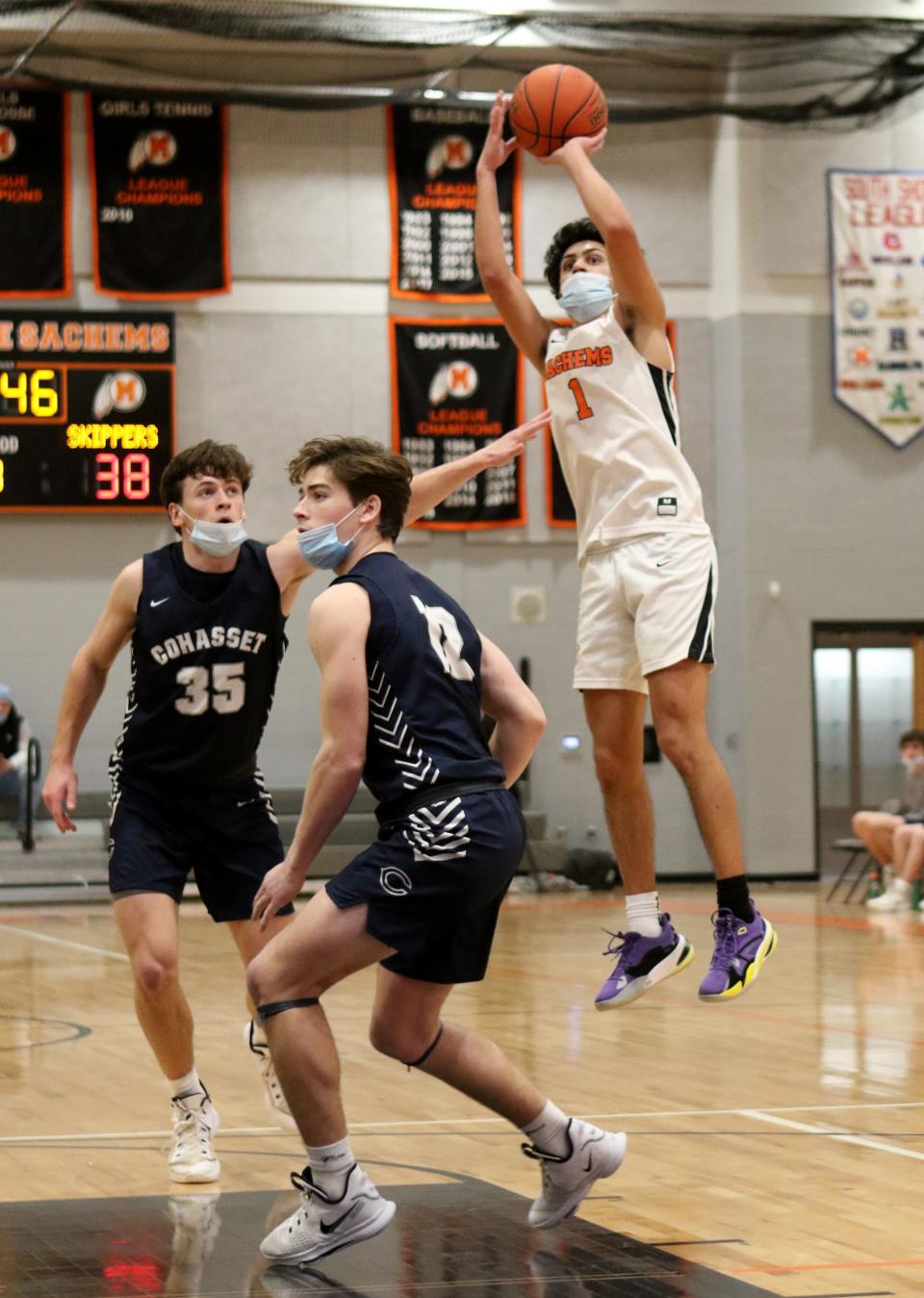 Gianni Perea takes the jump shot Tuesday night against Cohasset. Perea had a game-high 29 points.