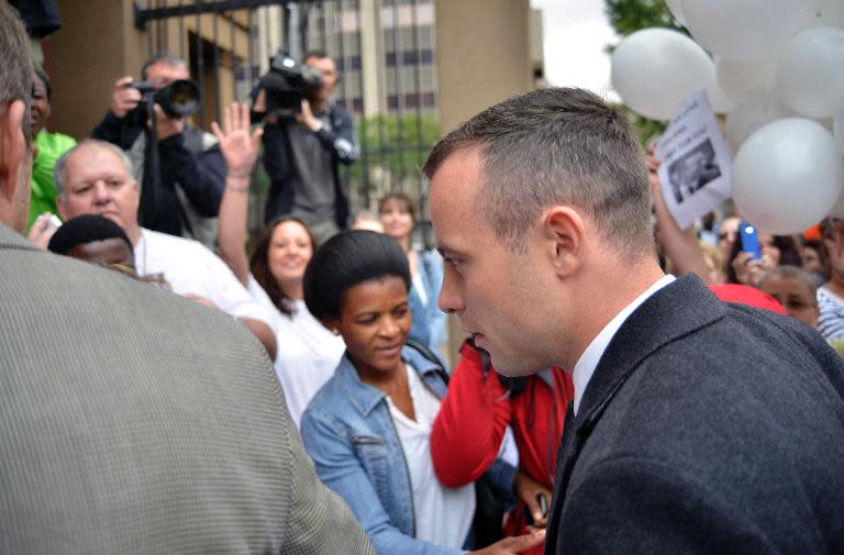 Oscar Pistorius arrives at court in Pretoria on April 14, 2014