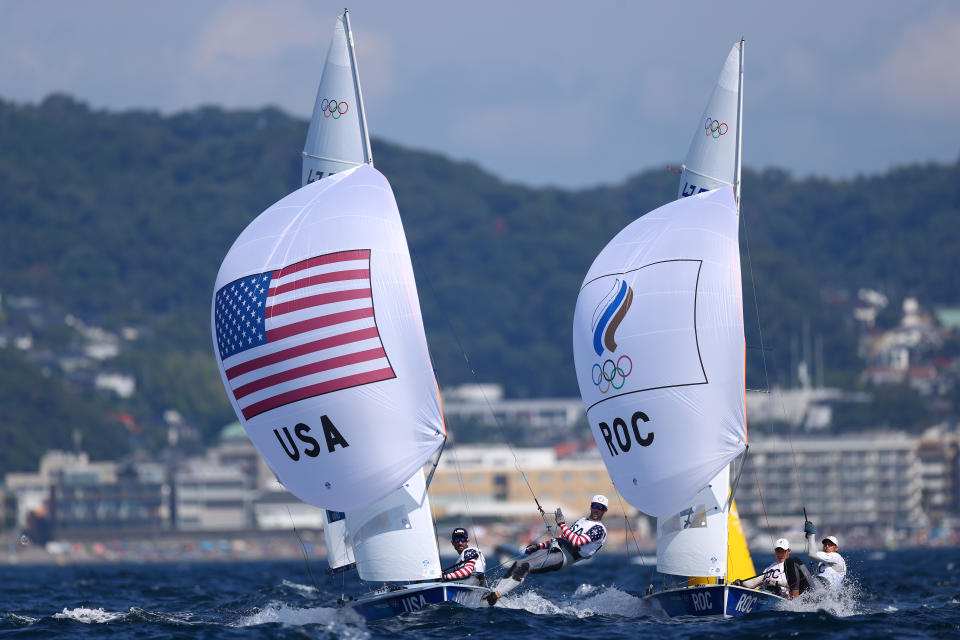 <p>FUJISAWA, JAPAN - AUGUST 01: Stuart McNay and David Hughes of Team United States and Pavel Sozykin and Denis Gribanov of Team ROC compete in the Men's 470 class on day nine of the Tokyo 2020 Olympic Games at Enoshima Yacht Harbour on August 01, 2021 in Fujisawa, Kanagawa, Japan. (Photo by Clive Mason/Getty Images)</p> 