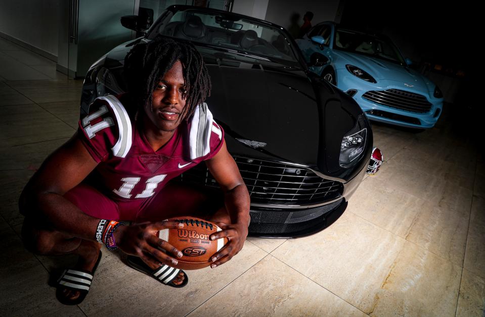 Olsen Patt Henry, First Baptist, is No. 2 recruit in the Naples Daily News and News-Press' Big 15 for 2022. Cars provided by and photos taken at Naples Luxury Imports. 