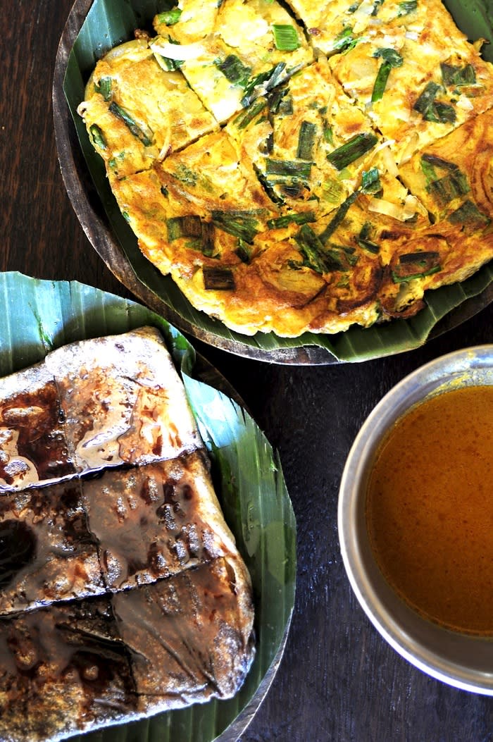 Favorite orders: Martabak and prata bread with curry are two favorite items on the menu at Warung Bunana. (