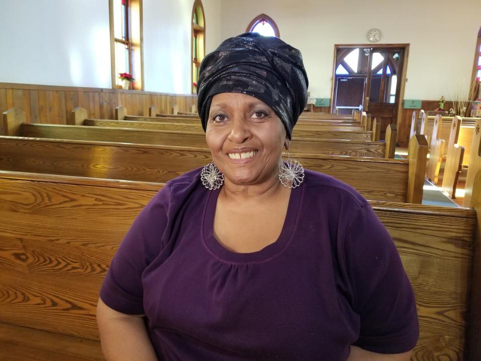 Lana Talbot, coordinator of Sandwich First Baptist Church, offers tours of the building.