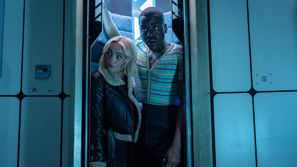  The 15th Doctor and Ruby Sunday look out of the TARDIS' doors in Doctor Who season 14. 