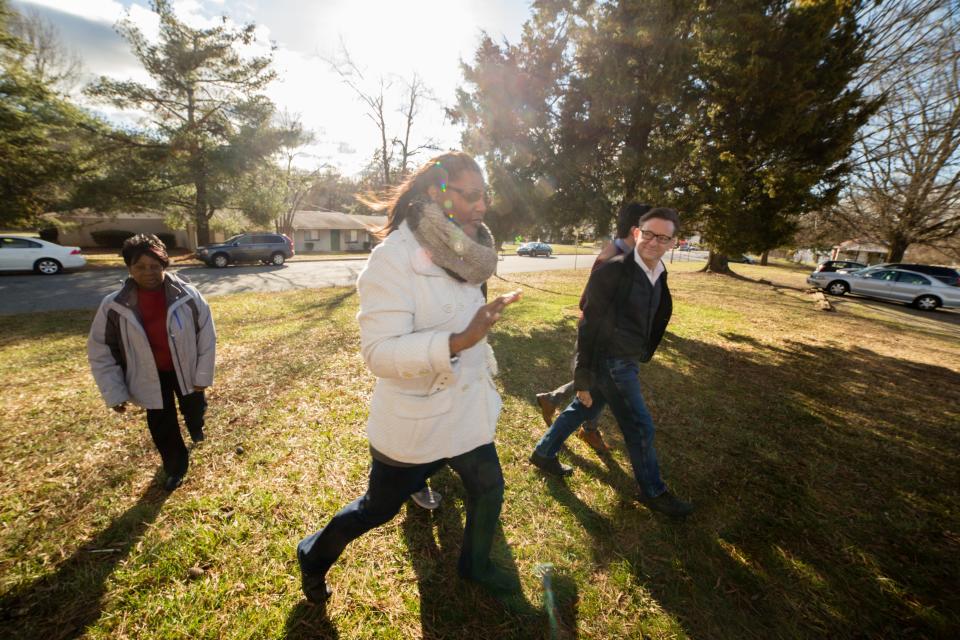 In 2017, community activist Sandra Williams, from left, Josie Williams of the Greensboro Housing Coalition, and then Center for Housing and Community Studies at the University North Carolina-Greensboro Director Stephen Sills examined asthma hot spots in Greensboro, North Carolina. Josie Williams is now executive director of the Greensboro Housing Coalition.