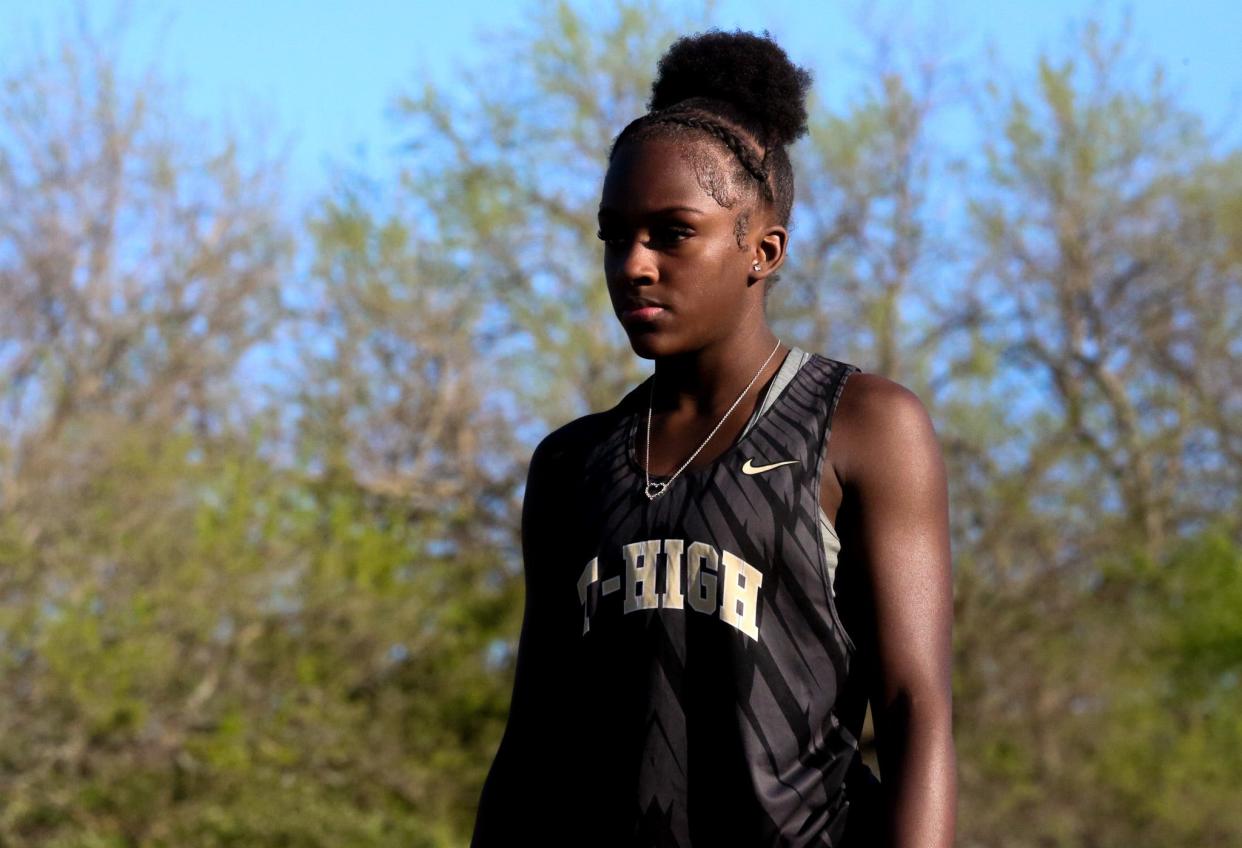 Topeka High's Ahsieyrhuajh Rayton has become a force in the triple jump event after learning the techniques a few weeks ago.