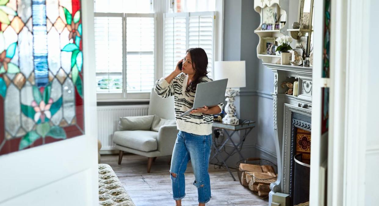 The perfect laptop desk for comfortable, at-home working. (Getty Images) 