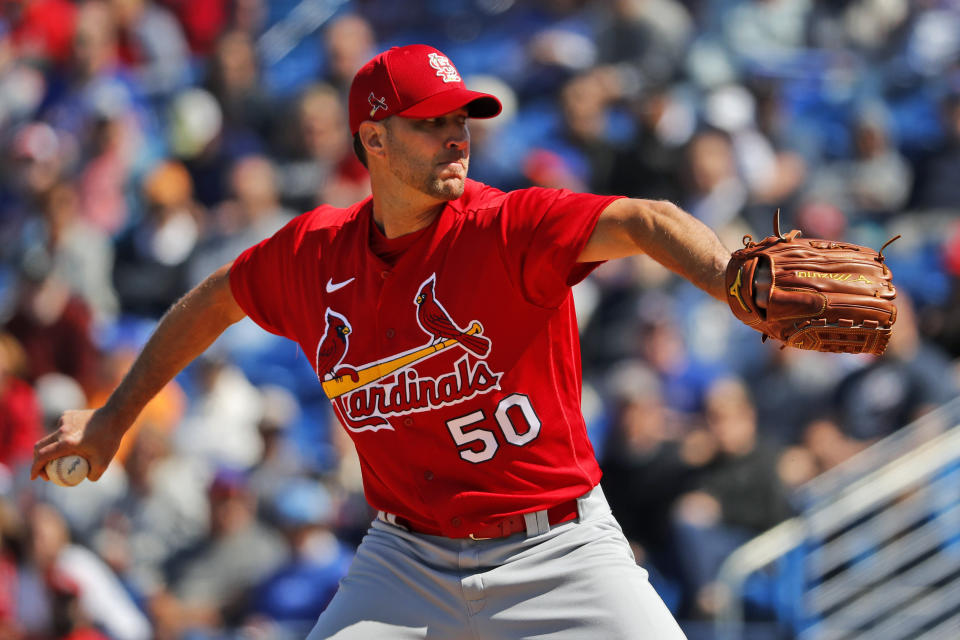 St. Louis Cardinals pitcher Adam Wainwright throws during the first inning of a spring training baseball game against the New York Mets Friday, Feb. 28, 2020, in Port St. Lucie, Fla. (AP Photo/Jeff Roberson)