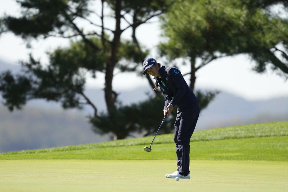 Celine Boutier of France putts on the fourth hole during the third round of the BMW Ladies Championship at the Seowon Hills Country Club in Paju, South Korea, Saturday, Oct. 21, 2023. (AP Photo/Lee Jin-man)