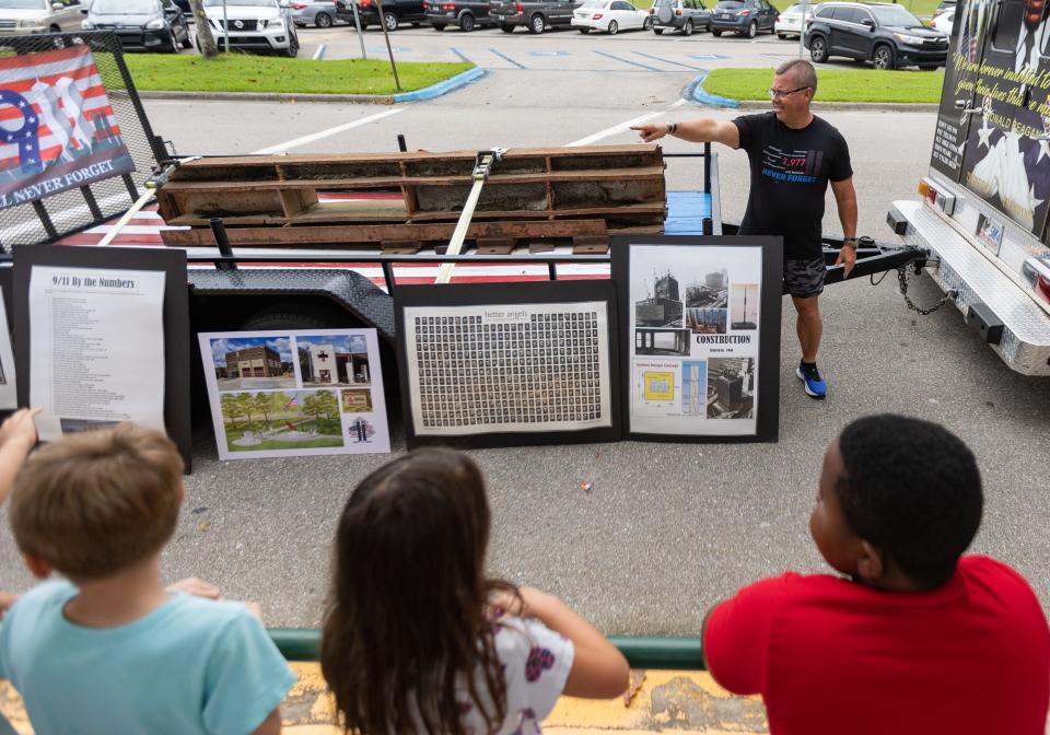 Michael Terhune, a retired Tallahassee Fire Department firefighter, speaks to students at Roberts Elementary School about the history of 9/11 just days before the 21st year anniversary of the tragic event Friday, Sept. 9, 2022. 