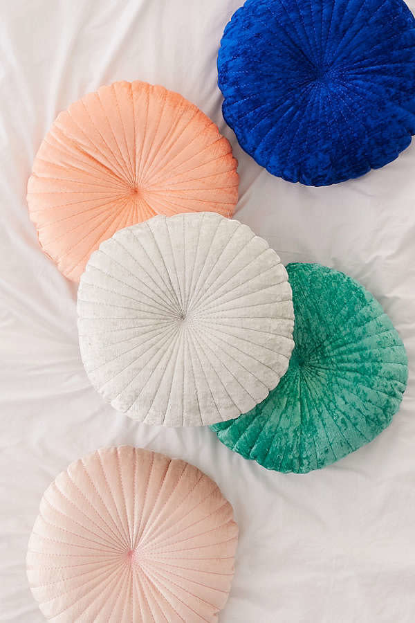 Get it <a href="https://www.urbanoutfitters.com/shop/shelly-round-velvet-pillow?category=decorative-pillows-throw-blankets&amp;color=067" target="_blank">here</a>.&nbsp;