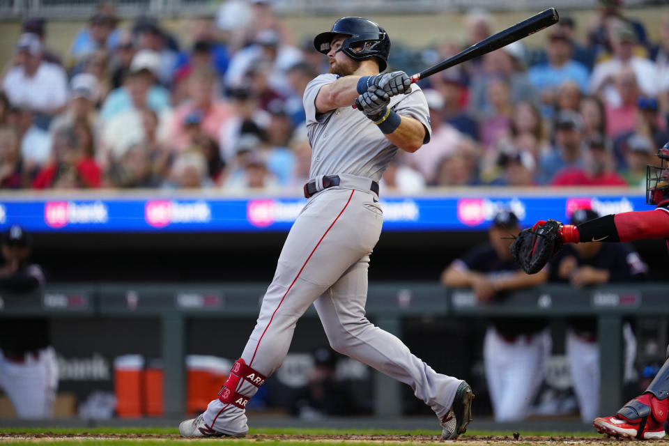 Boston Red Sox's Christian Arroyo watches a solo home run against the Minnesota Twins during the fourth inning of a baseball game Tuesday, June 20, 2023, in Minneapolis. (AP Photo/Abbie Parr)