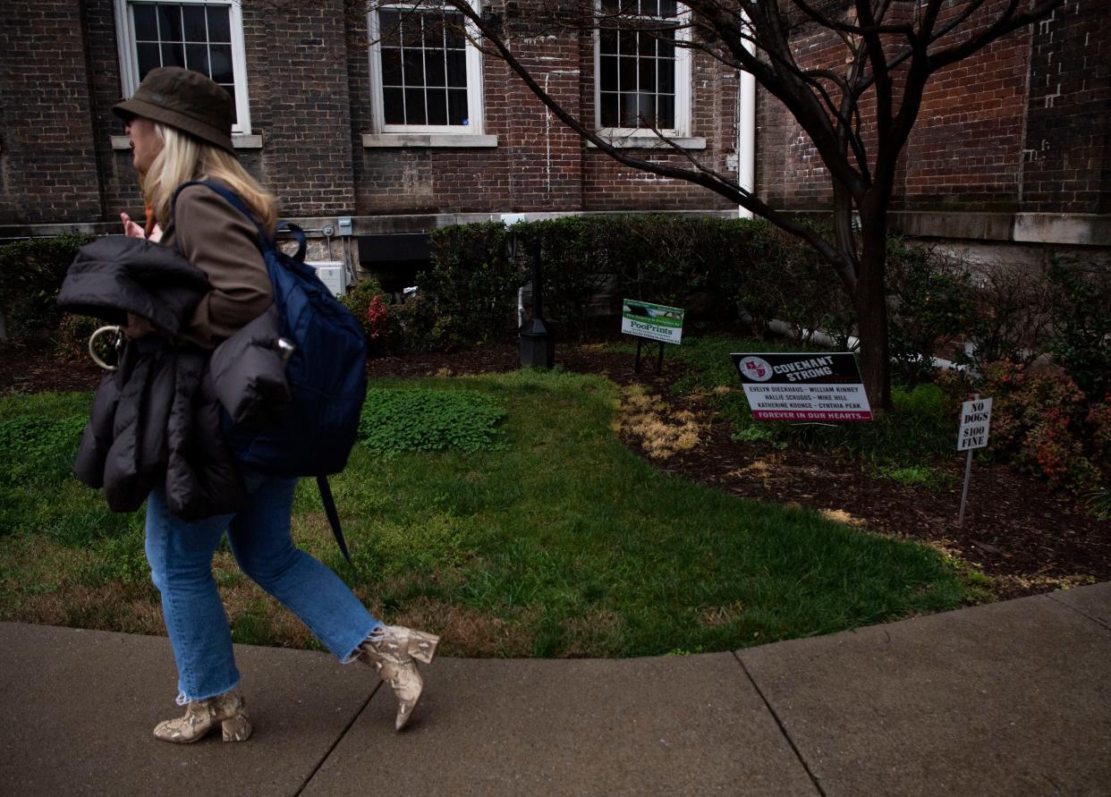 Kellie Reifenberger, teacher at Covenant School, heads to work at Brentwood Hills Church of Christ in Nashville, Tenn., Wednesday, March 6, 2024. A sign in the yard of her building reads, “Covenant Strong.”