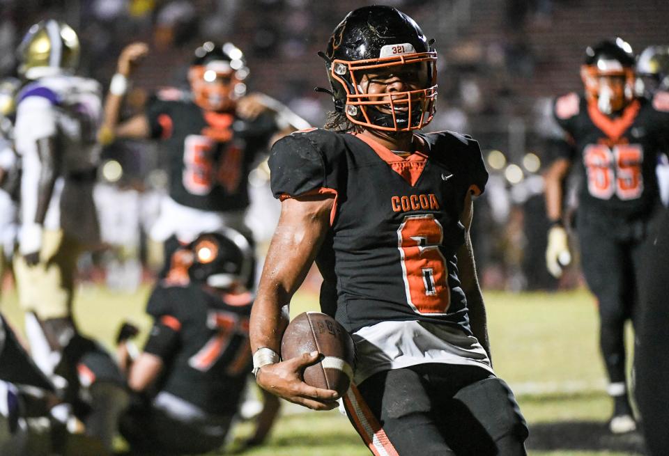 Malachi Coney scores a touchdown for Cocoa during their game against Booker in the FHSAA football Class 2S state semifinal Friday, December 1, 2023. Craig Bailey/FLORIDA TODAY via USA TODAY NETWORK