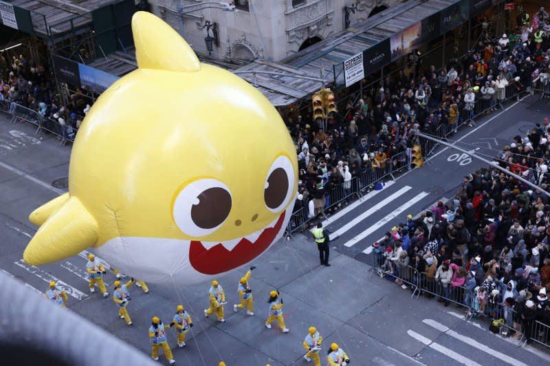 The Baby Shark balloon makes its way down Sixth Avenue during the Macy's Thanksgiving Day Parade 2023 in New York City on Thursday. Photo by John Angelillo/UPI