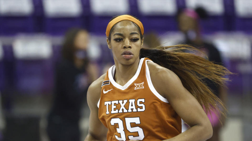 Texas forward Charli Collier (35) runs the court against TCU during the first half of an NCAA college basketball game, Sunday, March 7, 2021, in Fort Worth, Texas. (AP Photo/Ron Jenkins)