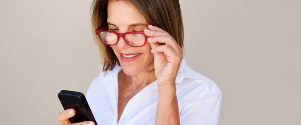 woman looking at phone