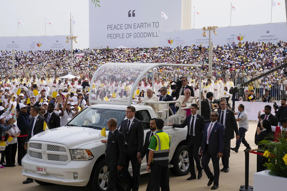 Pope Francis arrives to celebrate mass at the Bahrain National Stadium in Riffa, Bahrain, Saturday, Nov. 5, 2022. Pope Francis is making the November 3-6 visit to participate in a government-sponsored conference on East-West dialogue and to minister to Bahrain's tiny Catholic community, part of his effort to pursue dialogue with the Muslim world. (AP Photo/Alessandra Tarantino)