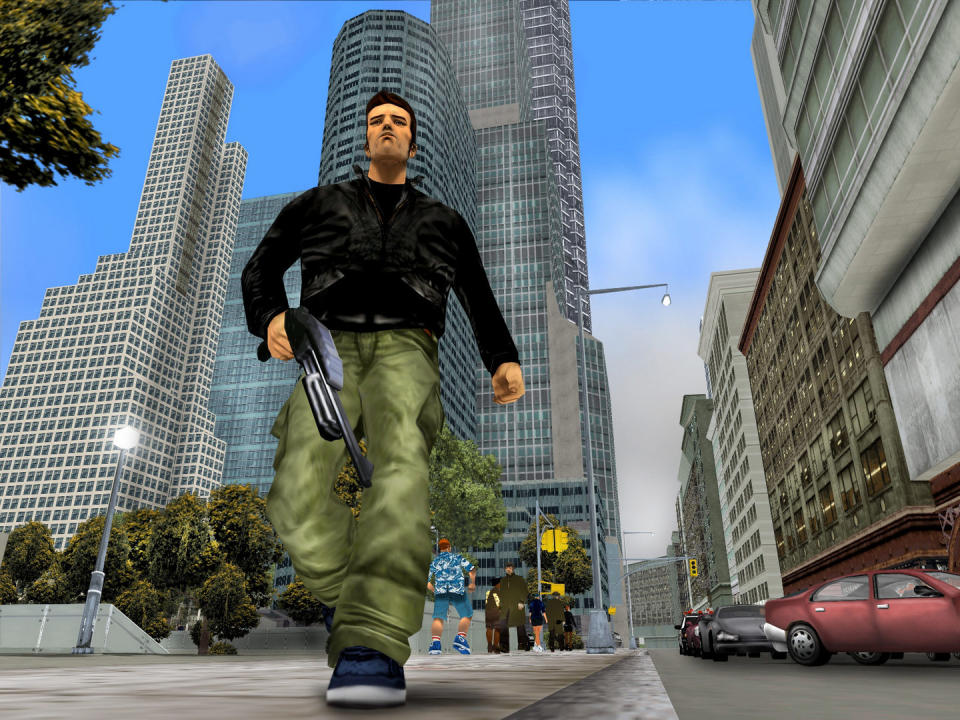 An armed, scrubby man standing in the street