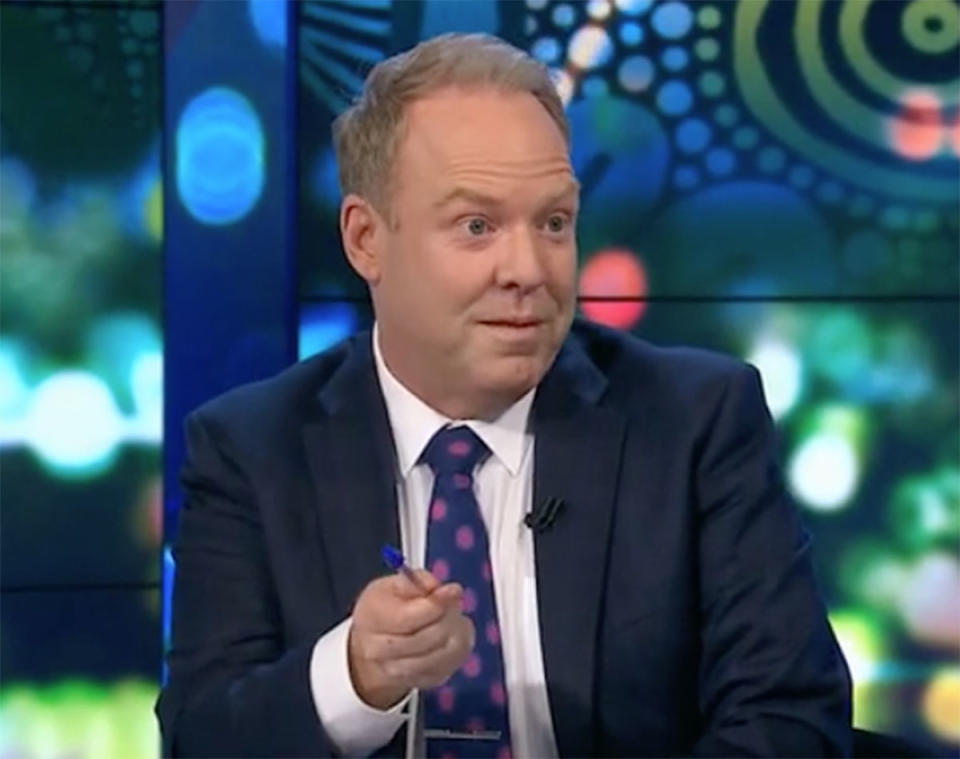 The Project host Peter Helliar wearing a suit on set