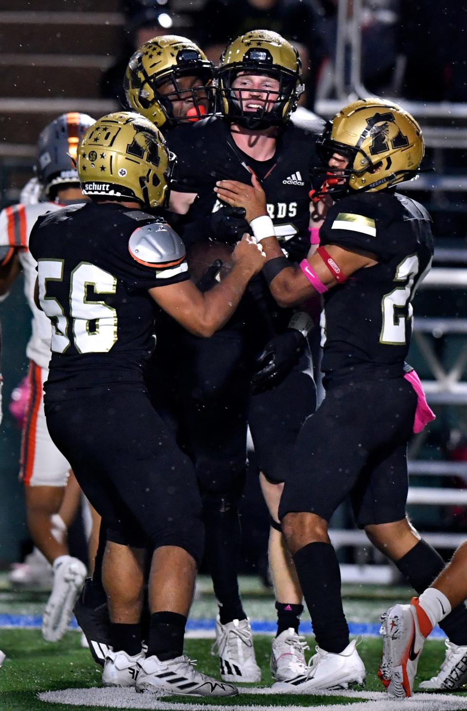 The Abilene High Eagles celebrate defensive lineman Luke Fisher's interception against Amarillo Caprock during Friday's football game at Shotwell Stadium Oct. 7, 2022. Final score was 45-0, Abilene High.