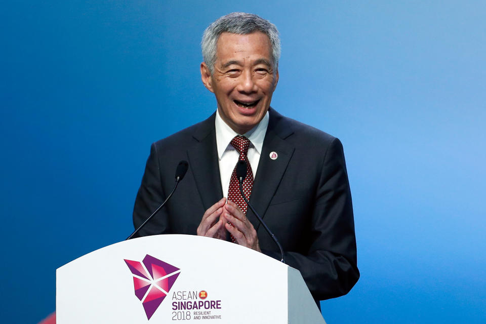 Singapore’s Prime Minister Lee Hsien Loong smiles during the Closing Ceremony of the ASEAN Summit and Related Summit in Singapore, November 15, 2018. REUTERS/Edgar Su)