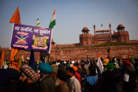 DELHI, INDIA - 2021/01/26: Protesters gathering at Red Fort during the demonstration. Farmers protesting against agricultural reforms breached barricades and clashed with police in the capital on the India's 72nd Republic Day. The police fired tear gas to restrain them, shortly after a convoy of tractors trundled through the Delhi's outskirts. (Photo by Manish Rajput/SOPA Images/LightRocket via Getty Images)