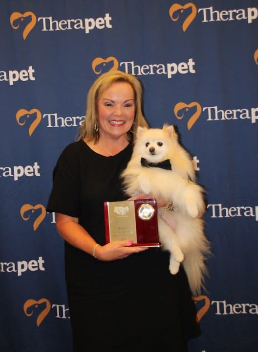 Therapet Louis and Stephanie Eby are the therapy team of the year. Photo courtesy of Therapet.