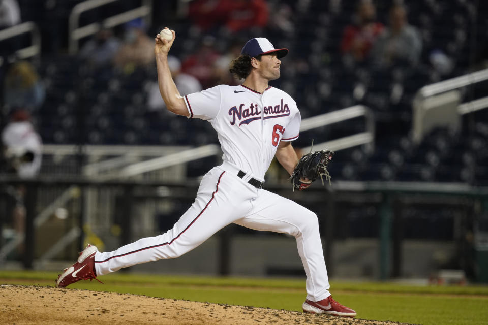 Washington Nationals pitcher Kyle Finnegan throws during the sixth inning of the team's baseball game against the Atlanta Braves at Nationals Park, Wednesday, May 5, 2021, in Washington. (AP Photo/Alex Brandon)