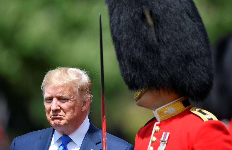 U.S. President Donald Trump inspects an honor guard at Buckingham Palace, in London, Britain, June 3, 2019. (Photo: Toby Melville/Pool/Reuters)