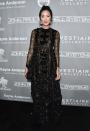 <p>Blogger Chriselle Lim stunned in a gothic black-and-gold Valentino gown complete with sheer sleeves. <i>[Photo: Getty]</i> </p>