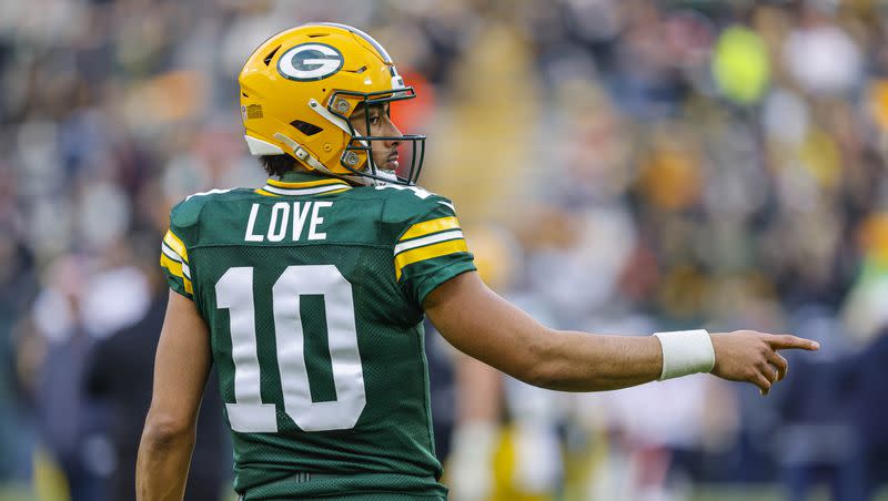 Green Bay Packers quarterback Jordan Love warms up before a against the Chicago Bears Sunday, Jan. 7, 2024, in Green Bay, Wis. The former  Utah State Aggie will lead the Packers against the Dallas Cowboys Sunday in a wild-card game.