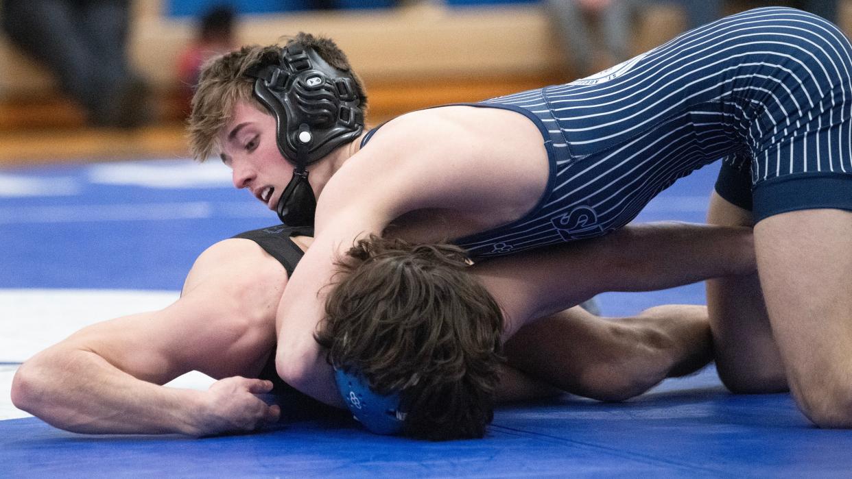St. Augustine's Carter Pack, top, controls Hammonton's Gavin Morris during the 120 lb. bout of the wrestling meet held at Hammonton High School on Wednesday, January 31, 2024. Pack defeated Morris by pin.