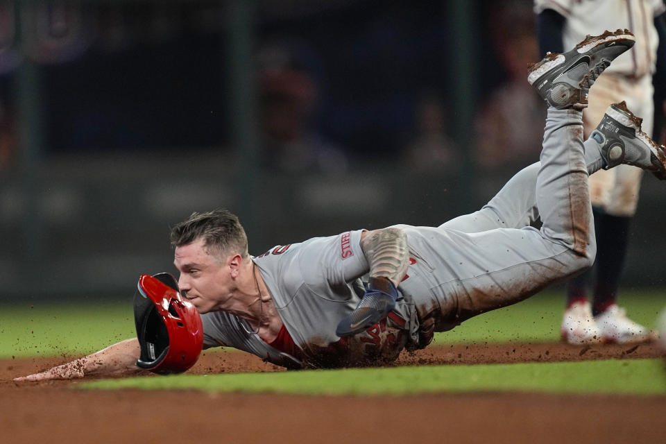 St. Louis Cardinals' Tyler O'Neill steals second base in the eighth inning of a baseball game against the Atlanta Braves, Tuesday, Sept. 5, 2023, in Atlanta. (AP Photo/John Bazemore)