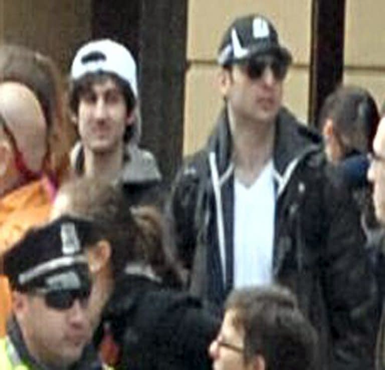 Image released by the FBI and acquired by AFP on April 19, 2013 shows Tamerlan Tsarnaev (R) and his younger brother Dzhokhar (L) in the crowd at the Boston Marathon on April 15, 2013. The parents of Tamerlan and Dzhokhar Tsarnaev are currently living in Dagestan, an overwhelmingly Muslim region on the Caspian Sea where the family briefly lived before leaving for the United States