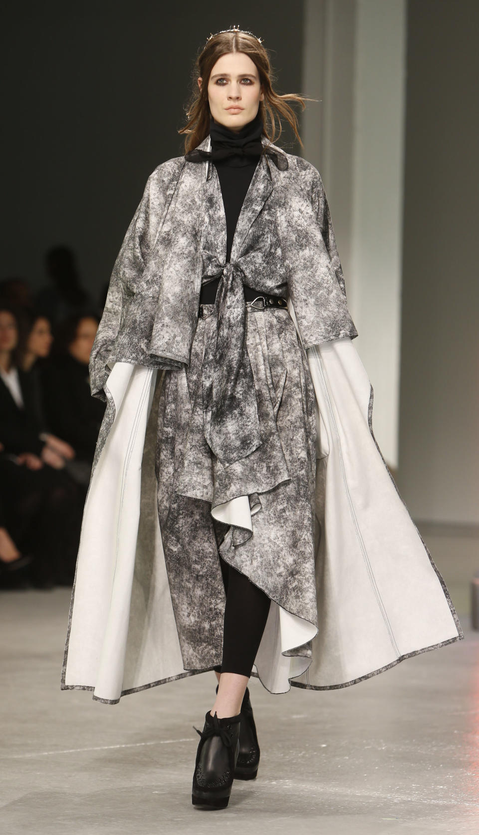 The Rodarte Fall 2013 collection is modeled during Fashion Week, Tuesday, Feb. 12, 2013 in New York. (AP Photo/Jason DeCrow)